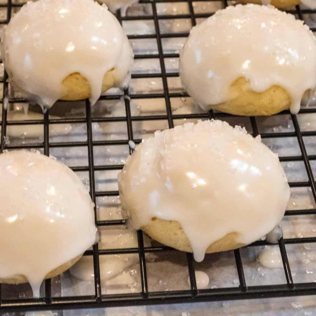 Anginetti cookies on a dryig rack.
