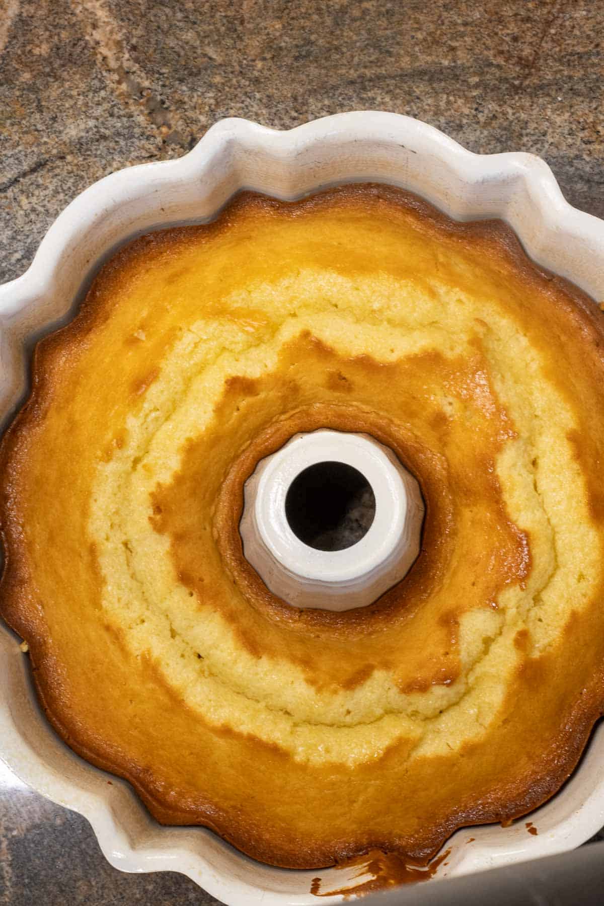 A baked Bundt cake in the tube pan.