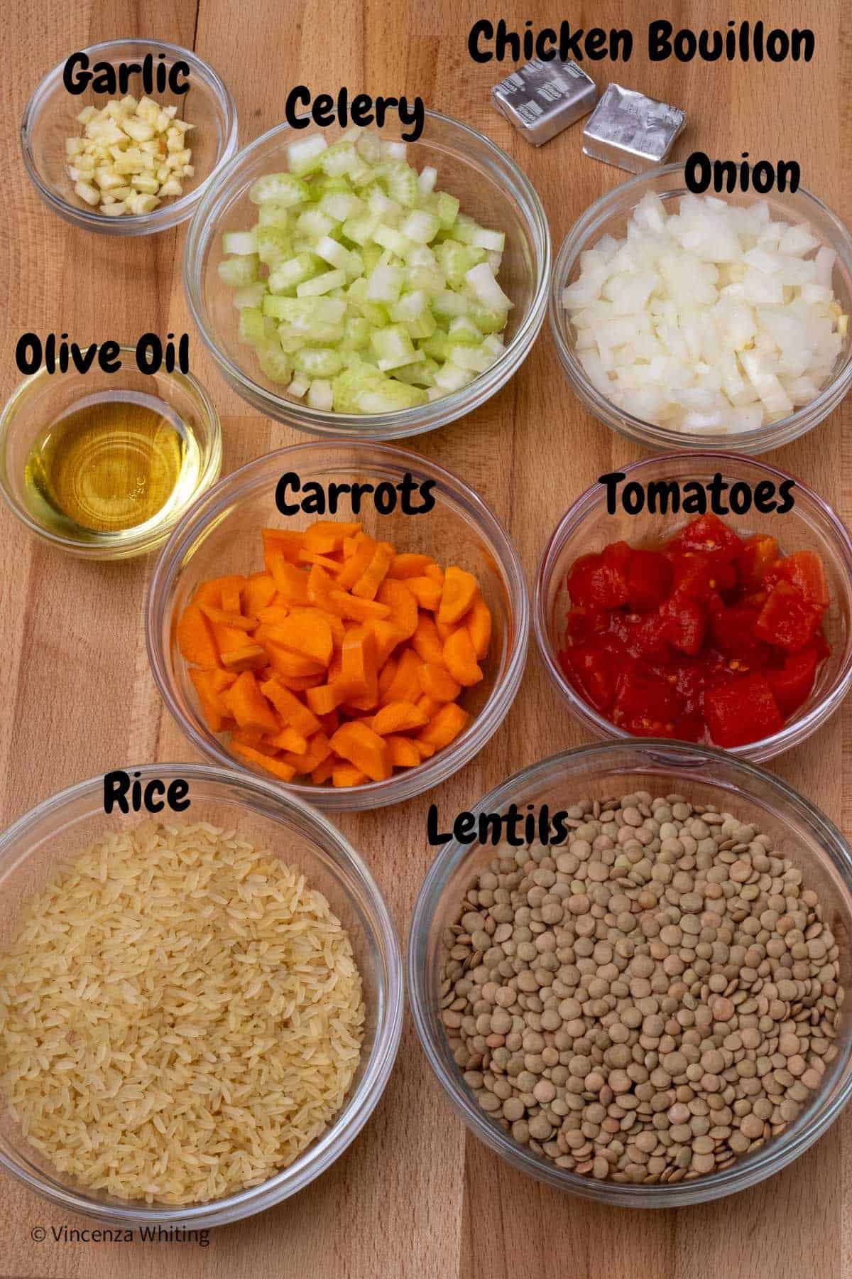 Ingredients for lentils and rice soup with labels over each item.