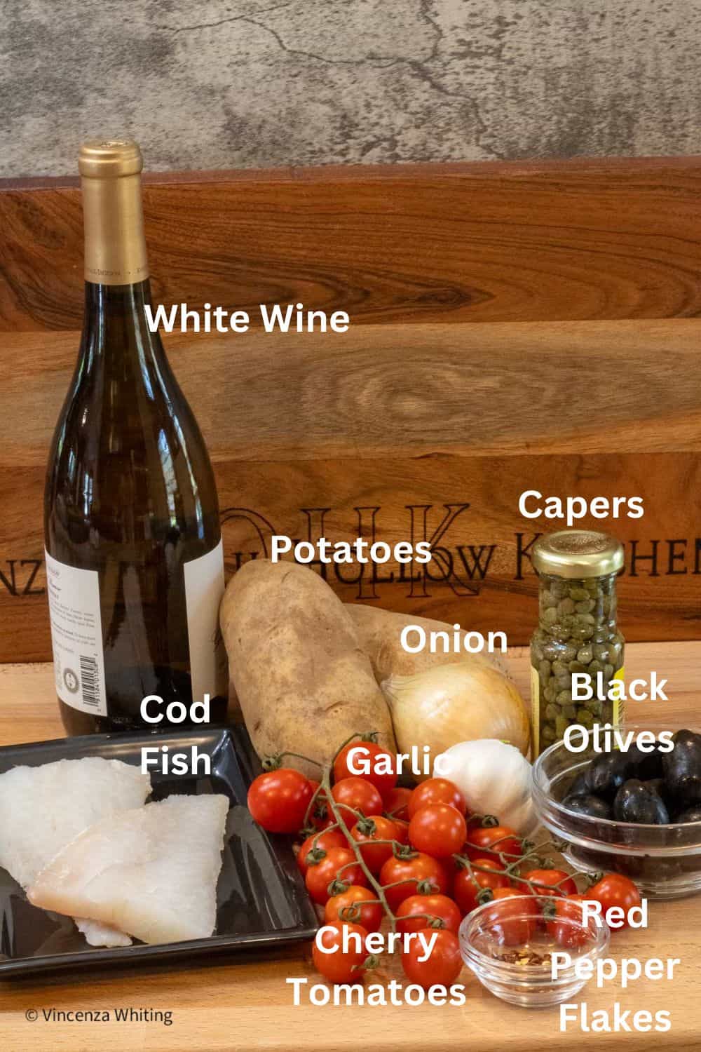Labeled ingredients for making Fish in a ghiotta style sauce