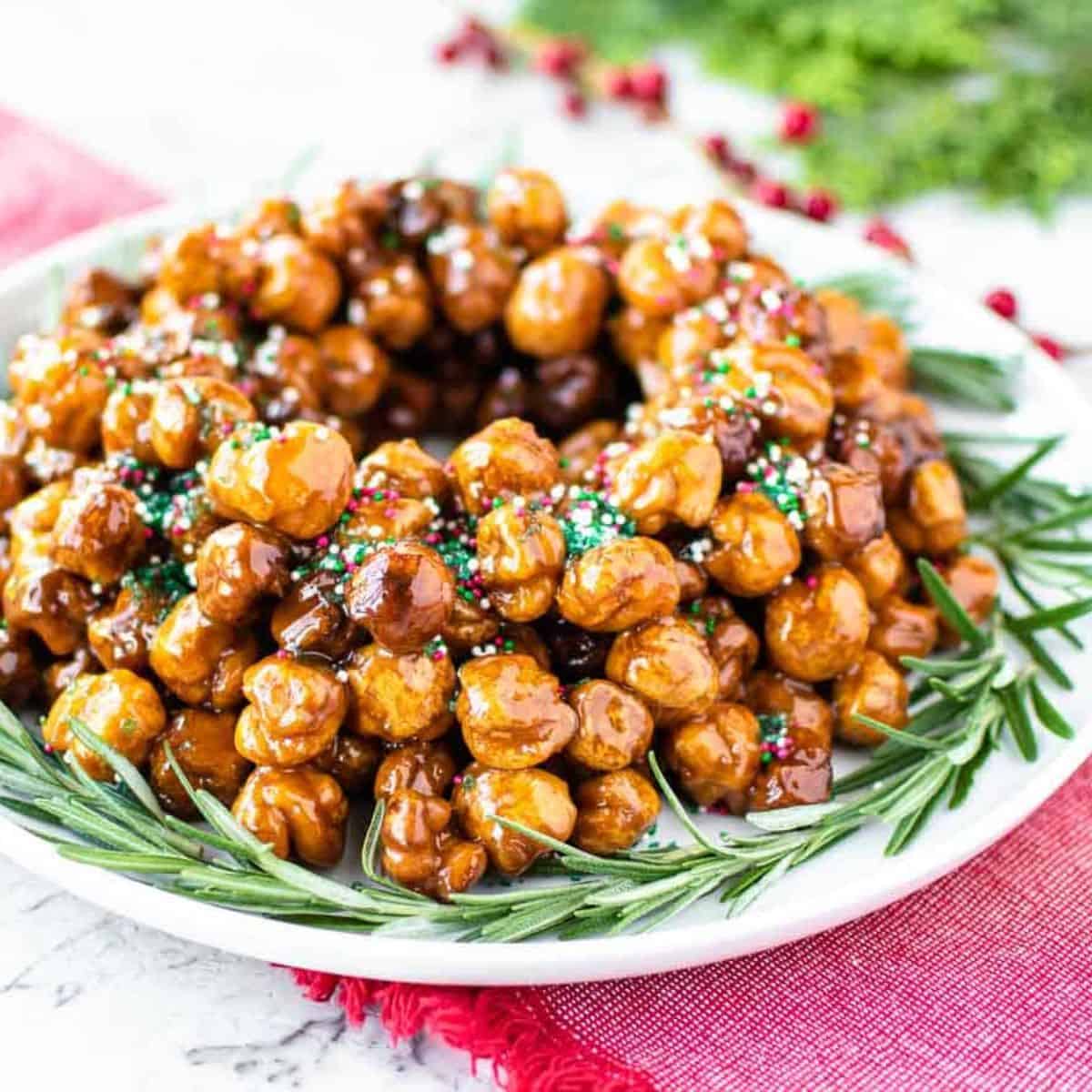 A Ring of Italian honey balls covered in honey and sprinkles.